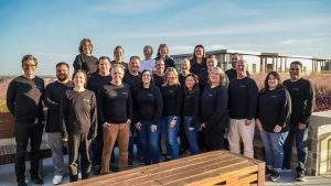 Texicare team members celebrating healthcare coverage launch for Lubbock small businesses, bringing affordable insurance solutions to West Texas